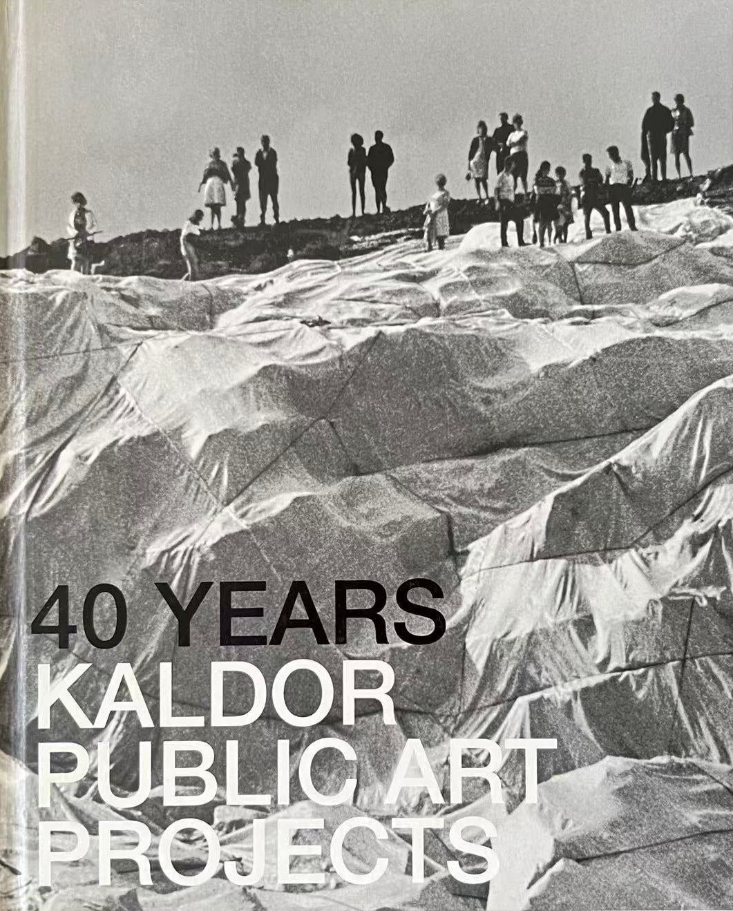 Book cover of '40 Years Kaldor Public Art Projects' with black and white photograph of people on a sculpture.