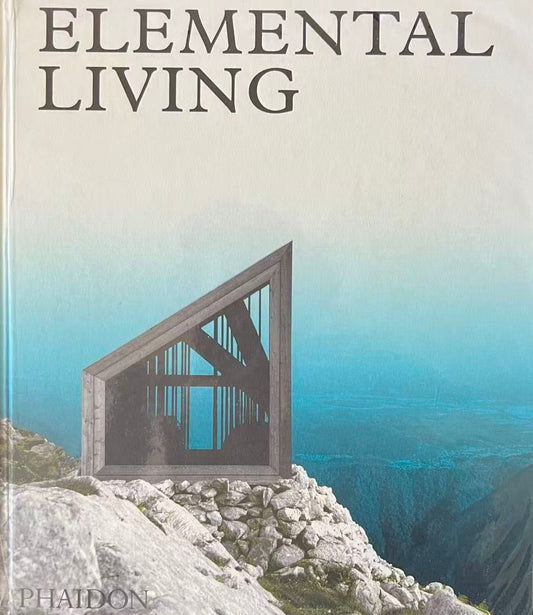Book titled 'Elemental Living' with a mountain and architectural design on the cover.