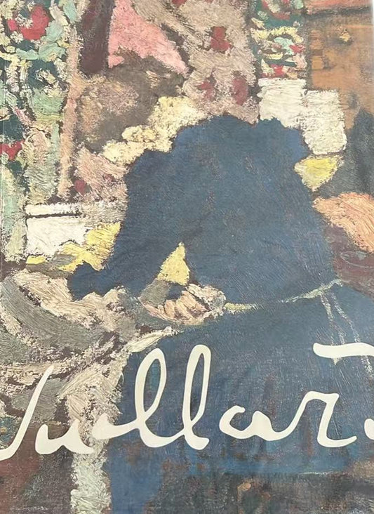 Book titled 'Villard' with a colorful cover on a green chair