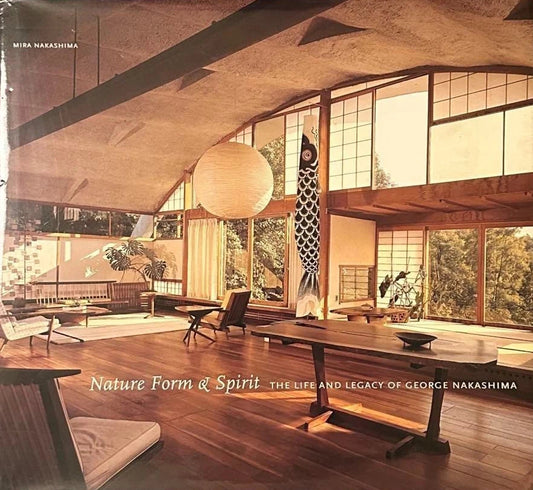 Book cover with interior design of a modern house and text 'Nature Form & Spirit' on a wooden surface.